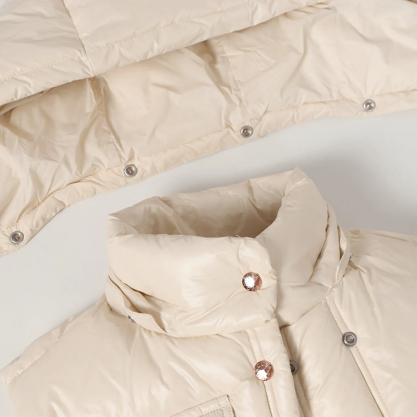 Fashionable hooded down vest