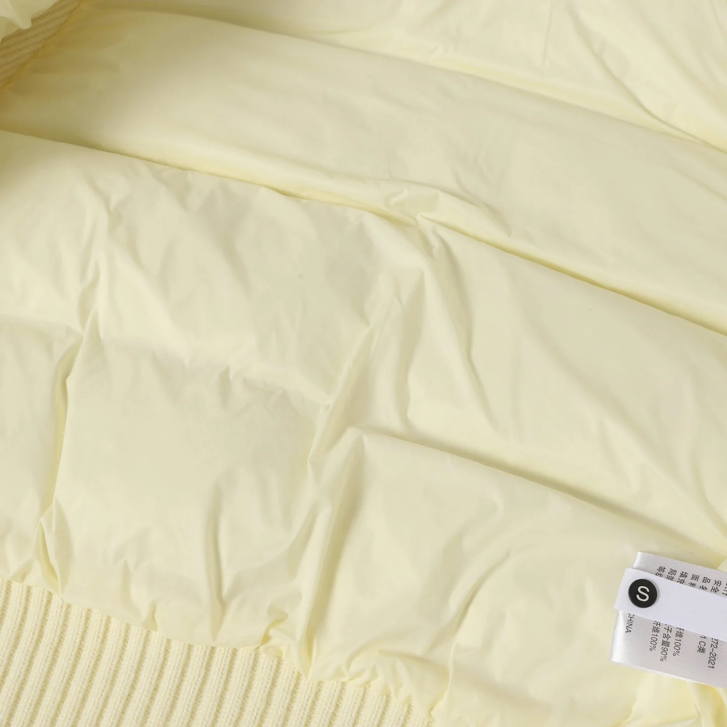 Knitted hooded down jacket