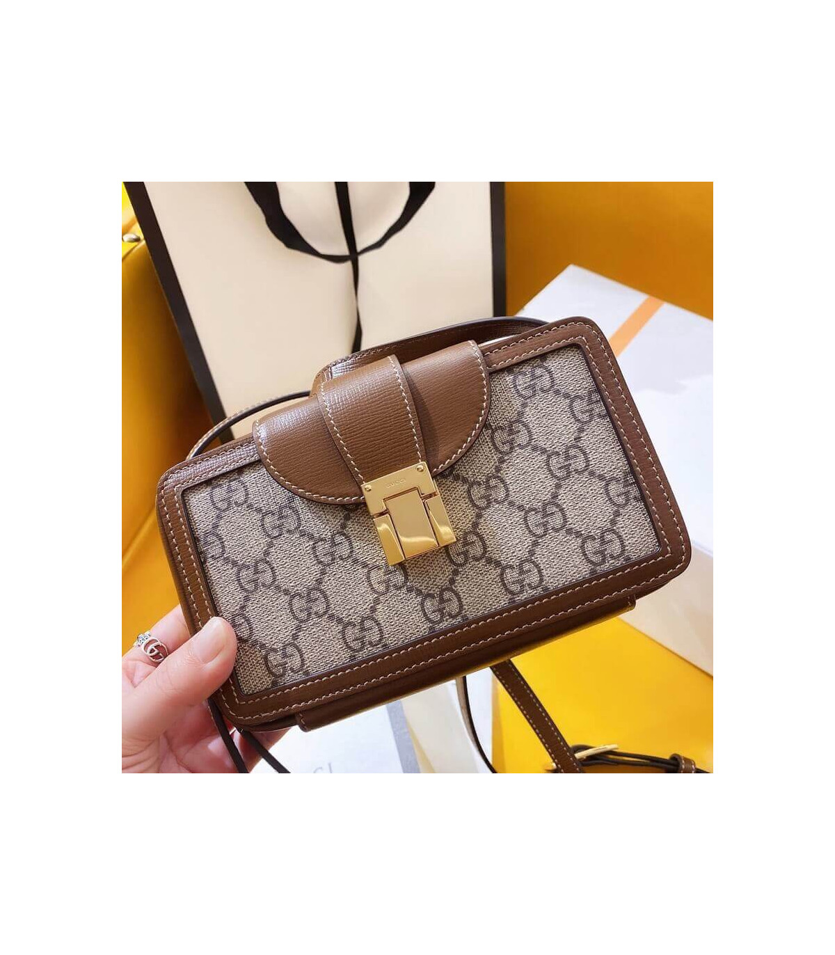 Gucci GG Mini Bag With Clasp Closure